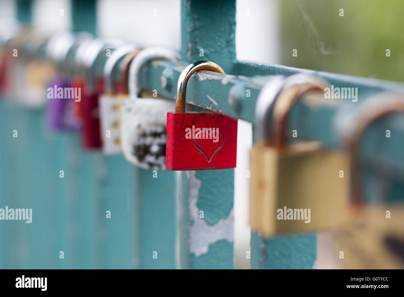 many padlocks on bridge love symbol Stock Photo Alamy