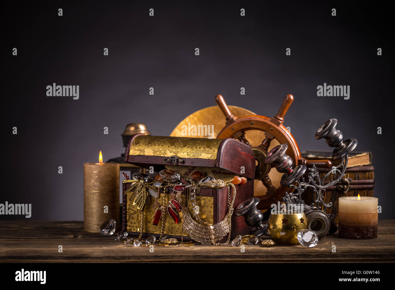Old wooden chest with golden jewelry Stock Photo
