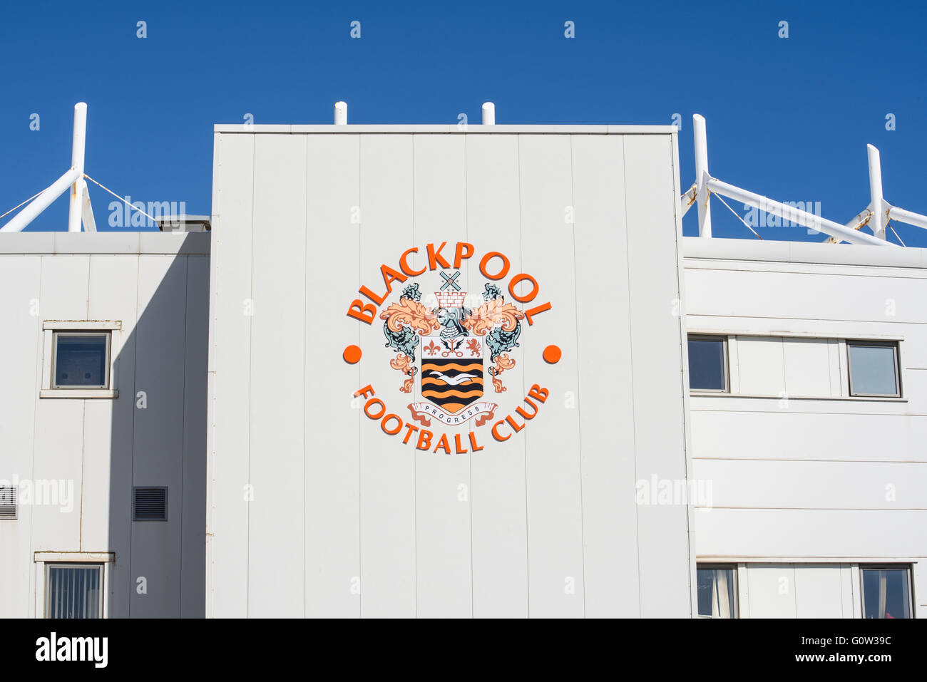 Blackpool Football Club main building showing the club name and emblem, photographed against a blue sky Stock Photo