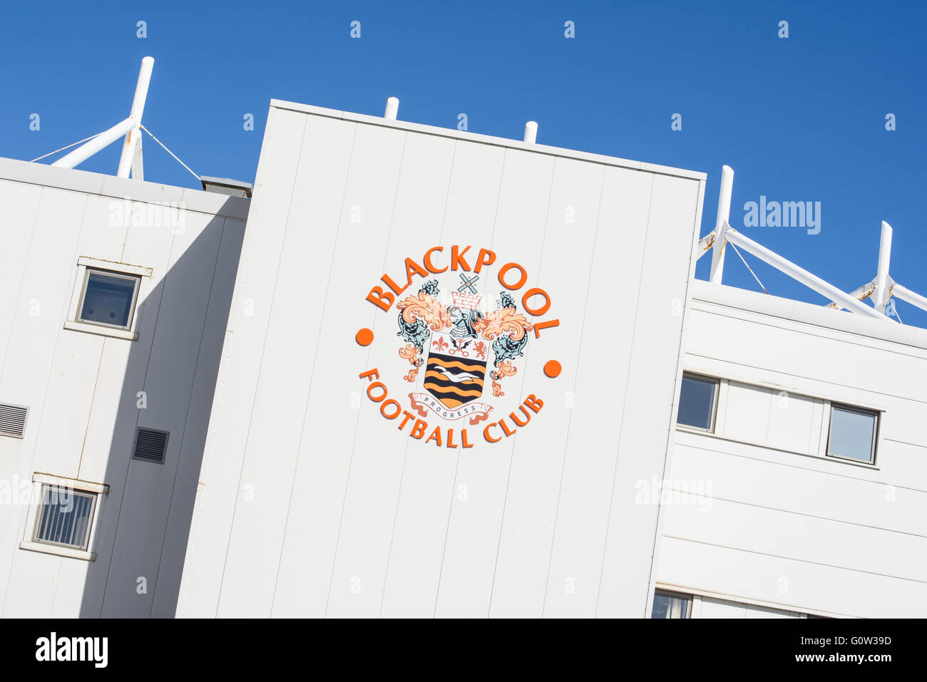 Blackpool Football Club main building showing the club name and emblem, photographed against a blue sky Stock Photo