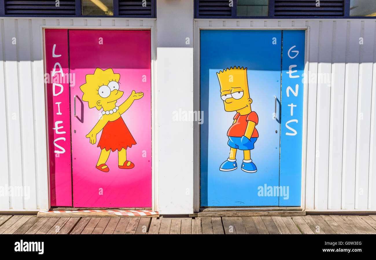 Cartoon characters Bart and Lisa Simpson depicted on the door of a public toilet on Central Pier in Blackpool, Lancashire, UK Stock Photo