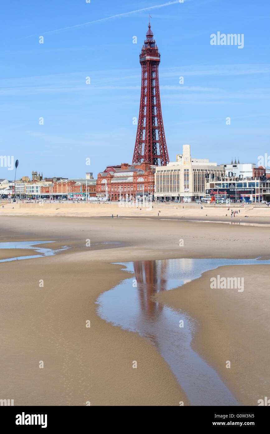 View across the beach and promenade towards Blackpool Tower in Blackpool, Lancashire, UK Stock Photo