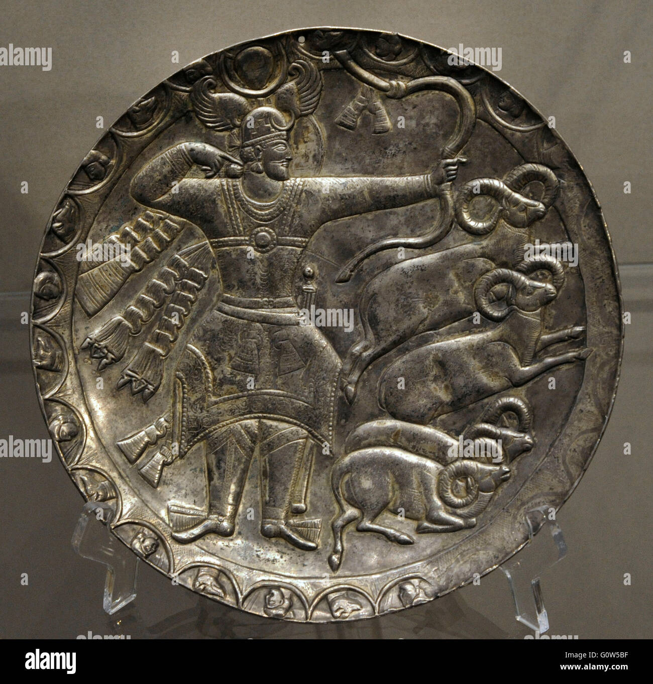 Sasanian Art. Plate with the king hunting. Silver; chasing, gilding. Iran. 5th century. Found as part of a treasure in Perm Region. The State Hermitage Museum. Saint Petersburg. Russia. Stock Photo