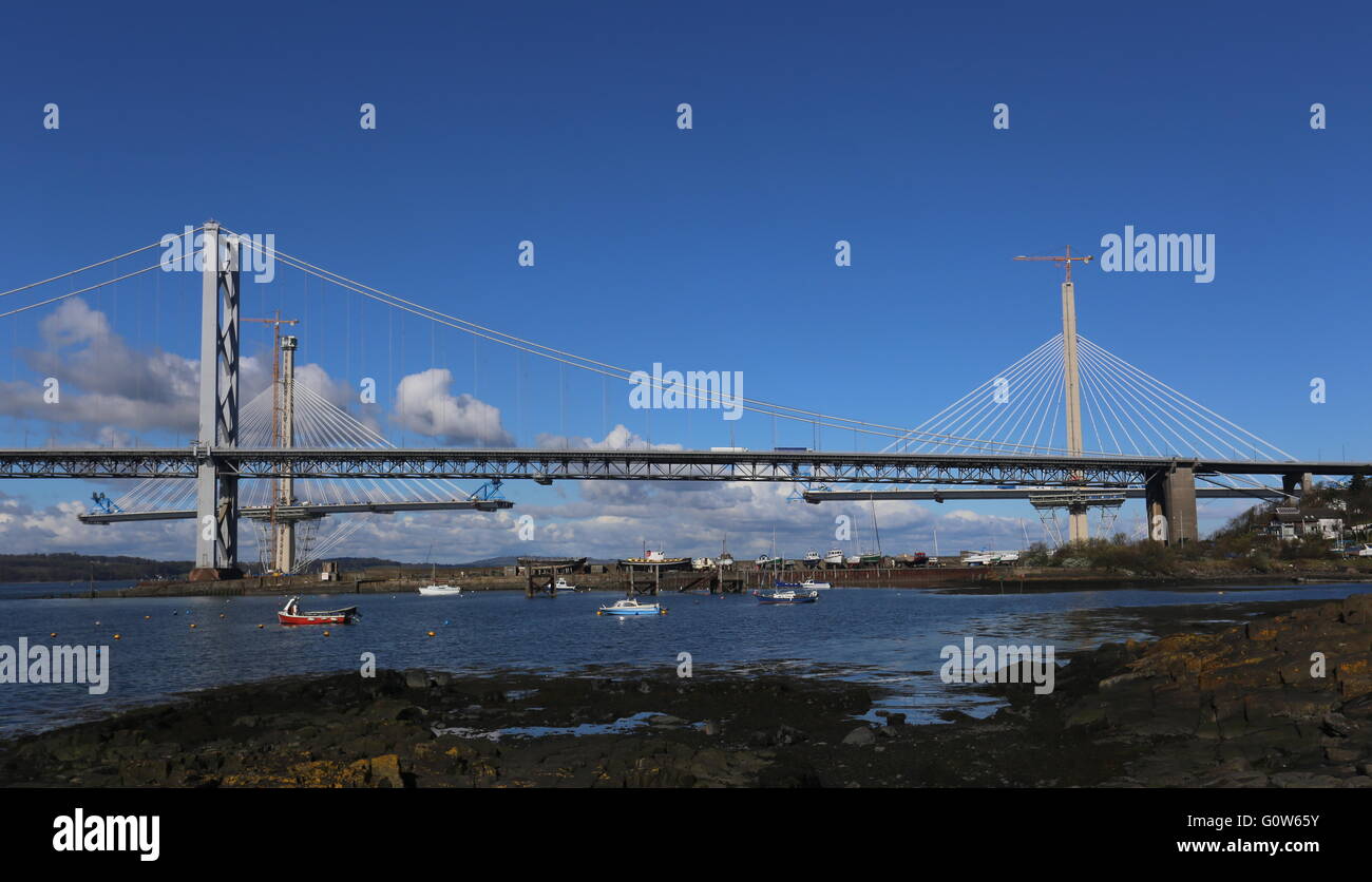 Forth Road Bridge and Queensferry Crossing under construction Firth of Forth Scotland  April 2016 Stock Photo