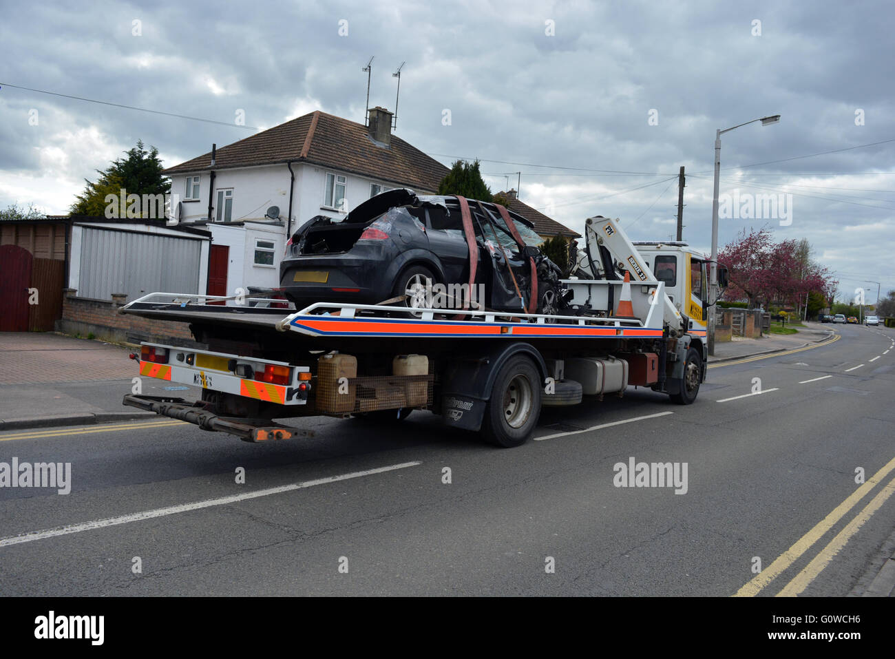 Car lifted after crash in Whitley Wood Lane in Reading, Berkshire. Charles Dye / Alamy Live News Stock Photo