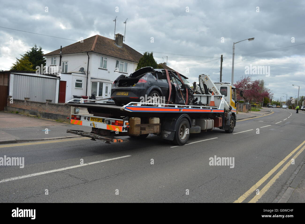 Car lifted after crash in Whitley Wood Lane in Reading, Berkshire. Charles Dye / Alamy Live News Stock Photo