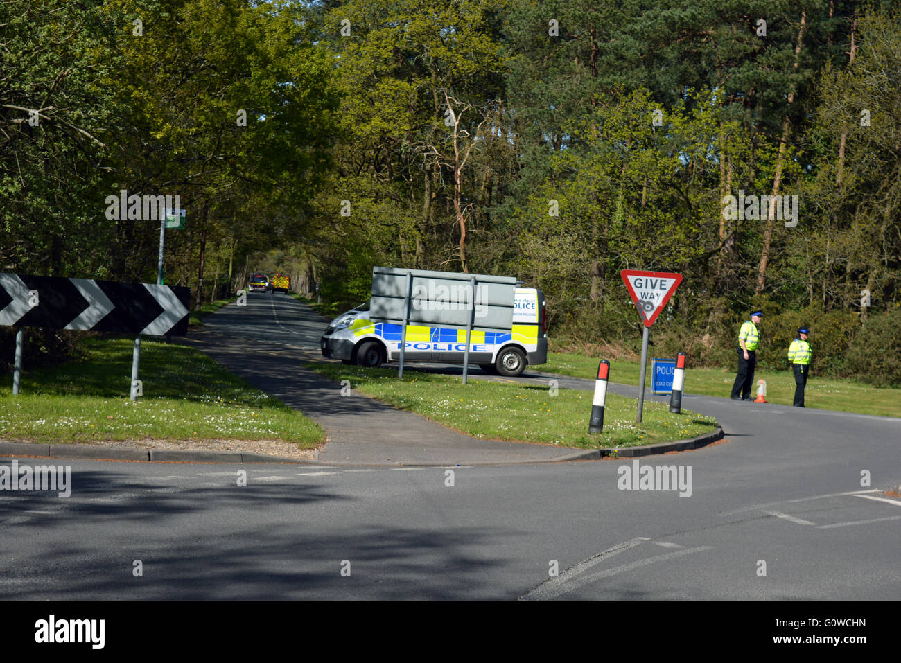 Police block burghfield road off leading to Englefield, Estate, due to thirty acre forest fire. Stock Photo