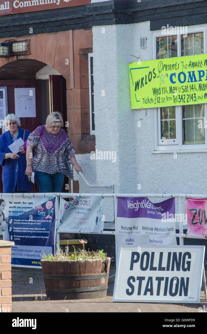West Kirby, Wirral, United Kingdom – 5th May 2016 – People coming out of polling stations after casting their vote in today’s series of elections across the United Kingdom. Elections are taking place for the Scottish Parliament, Northern Ireland and Welsh Assemblies and councils across England, as well as Police and Crime Commissioners and new Mayors being elected. Credit:  rsdphotography/Alamy Live News Stock Photo