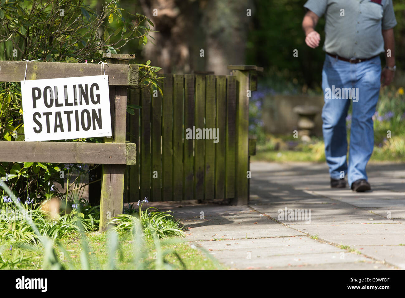 Formby, Merseyside. 5 May 2016. A member of the public leaves a polling station, near St Luke's Church, in Formby, after casting their vote in local elections, on 5 May 2016. Credit:  Harry Whitehead/Alamy Live News Stock Photo
