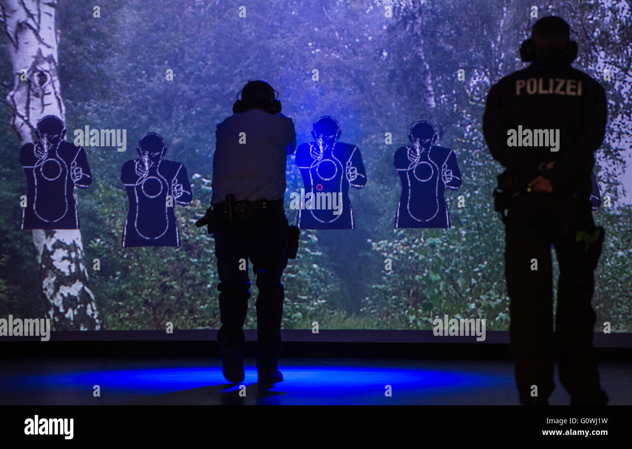Police officers train at the firing range in the new police regional