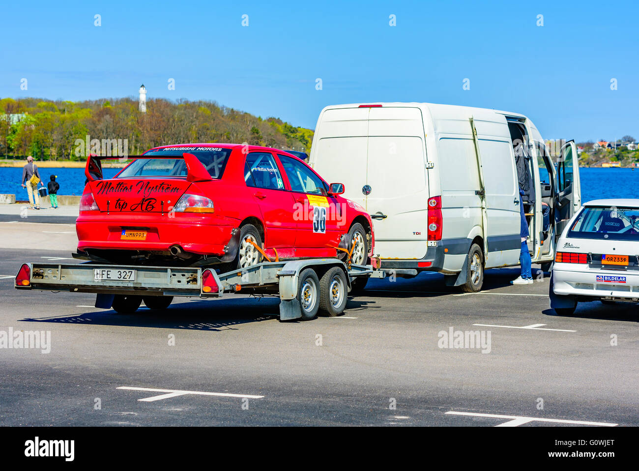 Karlskrona, Sweden. 5th May 2016. 41st South Swedish Rally is about to start. Preparations and arrivals are commencing. Here Mattias Nystroms red Mitsubishi Lancer EVO 8 has arrived to the docks in Karlskrona on a trailer. Mattias races for Ludvika MS together with codriver Alexander Glavsjo in the 4WD untrimmed (R4) group. Credit:  Ingemar Magnusson/Alamy Live News Stock Photo