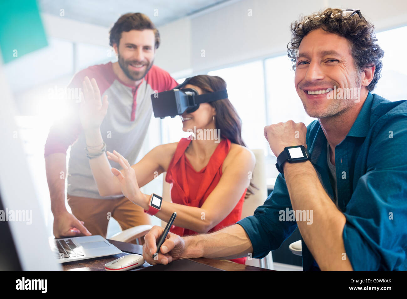 Colleagues using technology Stock Photo