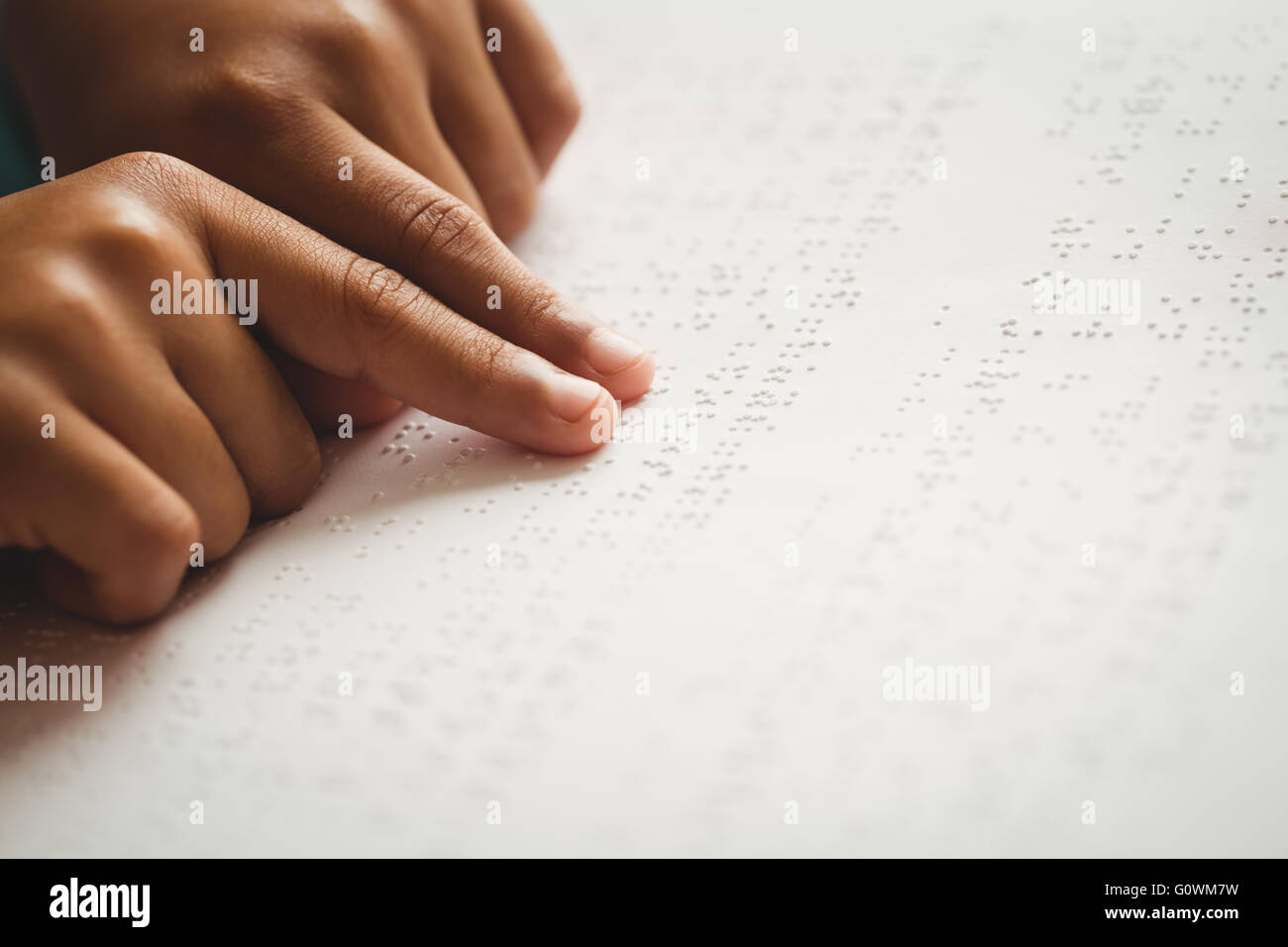 Child using braille to read Stock Photo Alamy