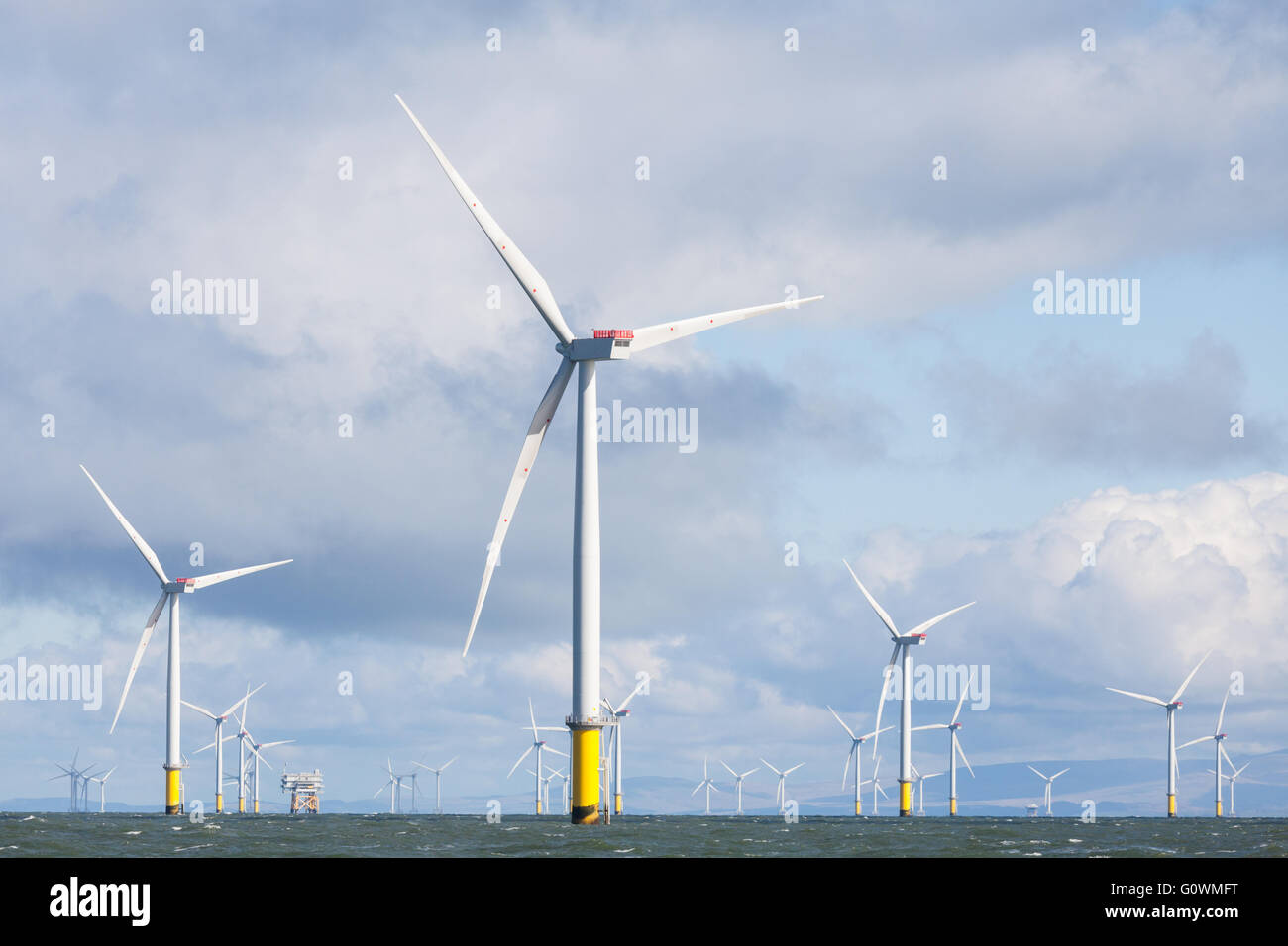 Turbines of Walney and West of Duddon Sands Offshore Wind Farms off the Cumbrian Coast in the UK Stock Photo