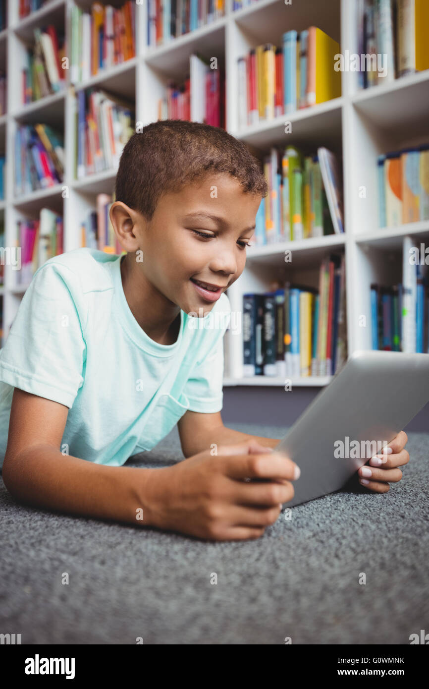 Little boy using a tablet Stock Photo - Alamy