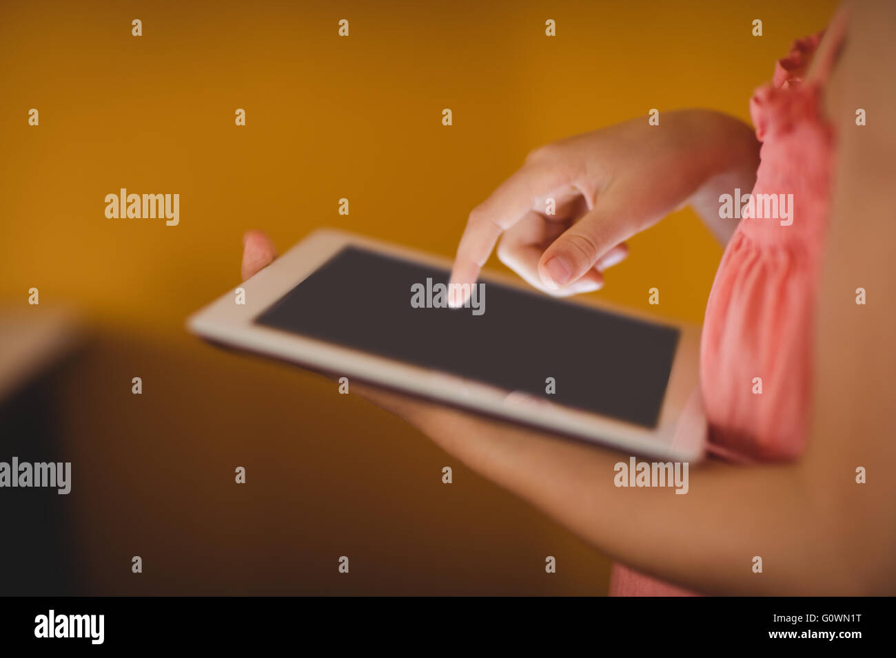 Child girl hand touching tablet hi-res stock photography and images - Alamy