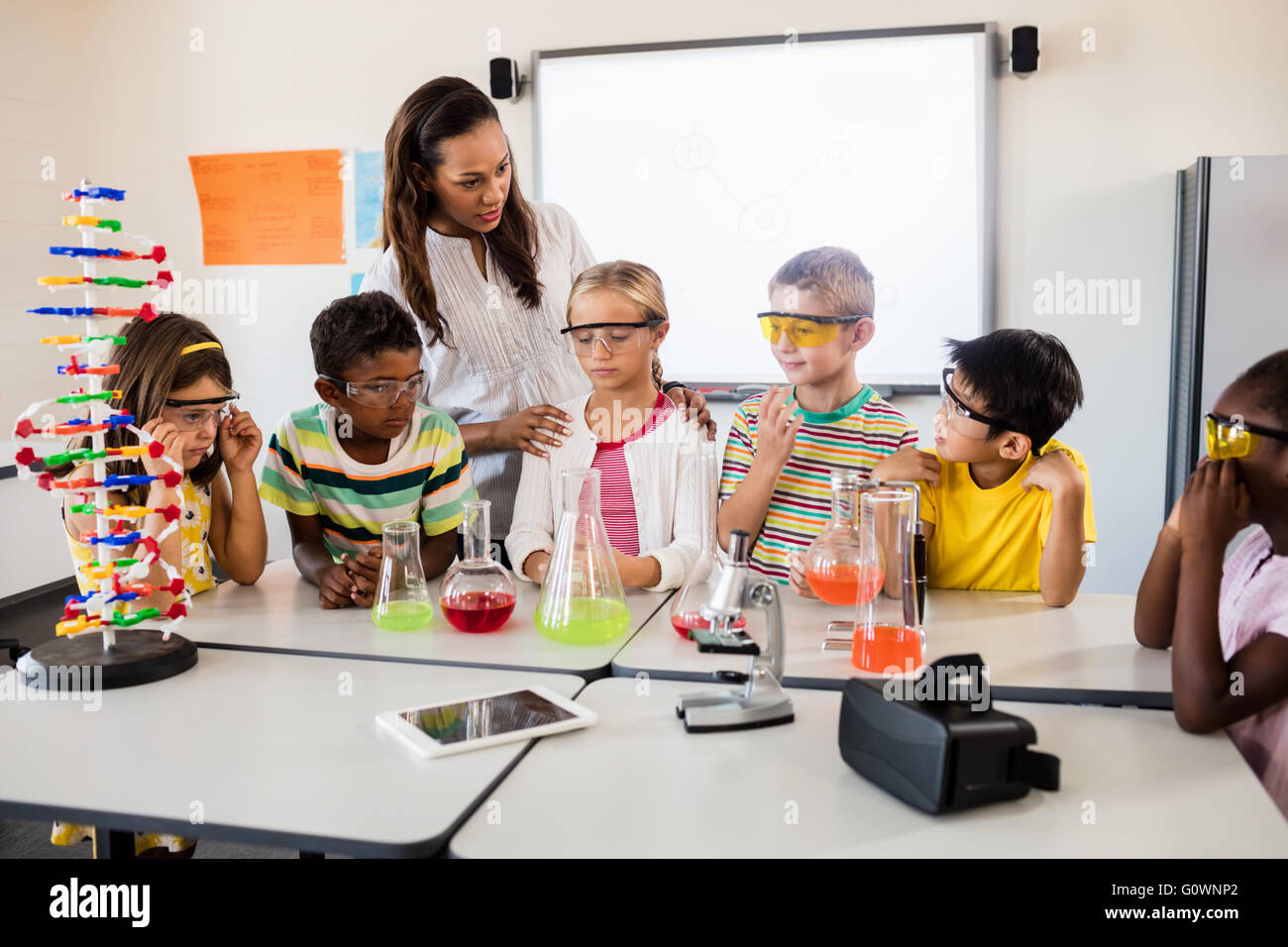 A teacher giving a science lesson Stock Photo Alamy