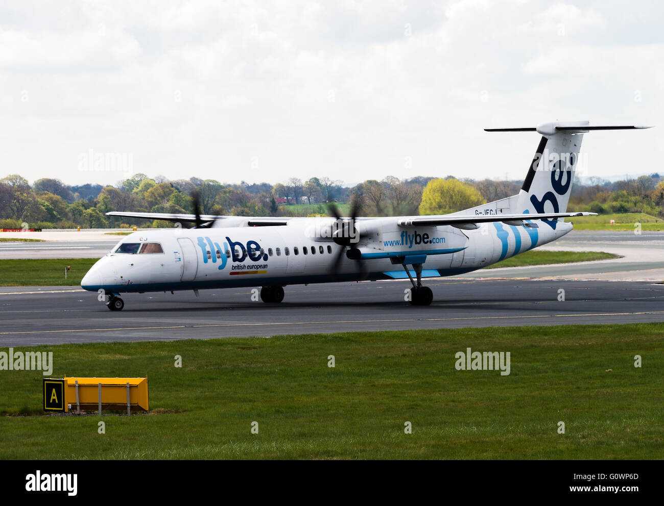 Flybe Airline Bombardier Dash 8-402Q Airliner G-JECJ Taxiing at Manchester International Airport England United Kingdom UK Stock Photo