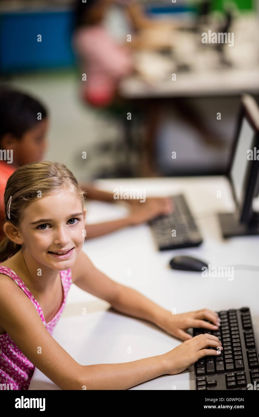 Children looking their computer Stock Photo Alamy