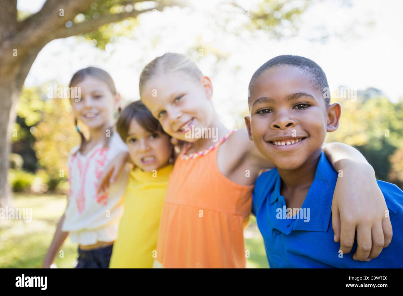 Children posing together for camera Stock Photo