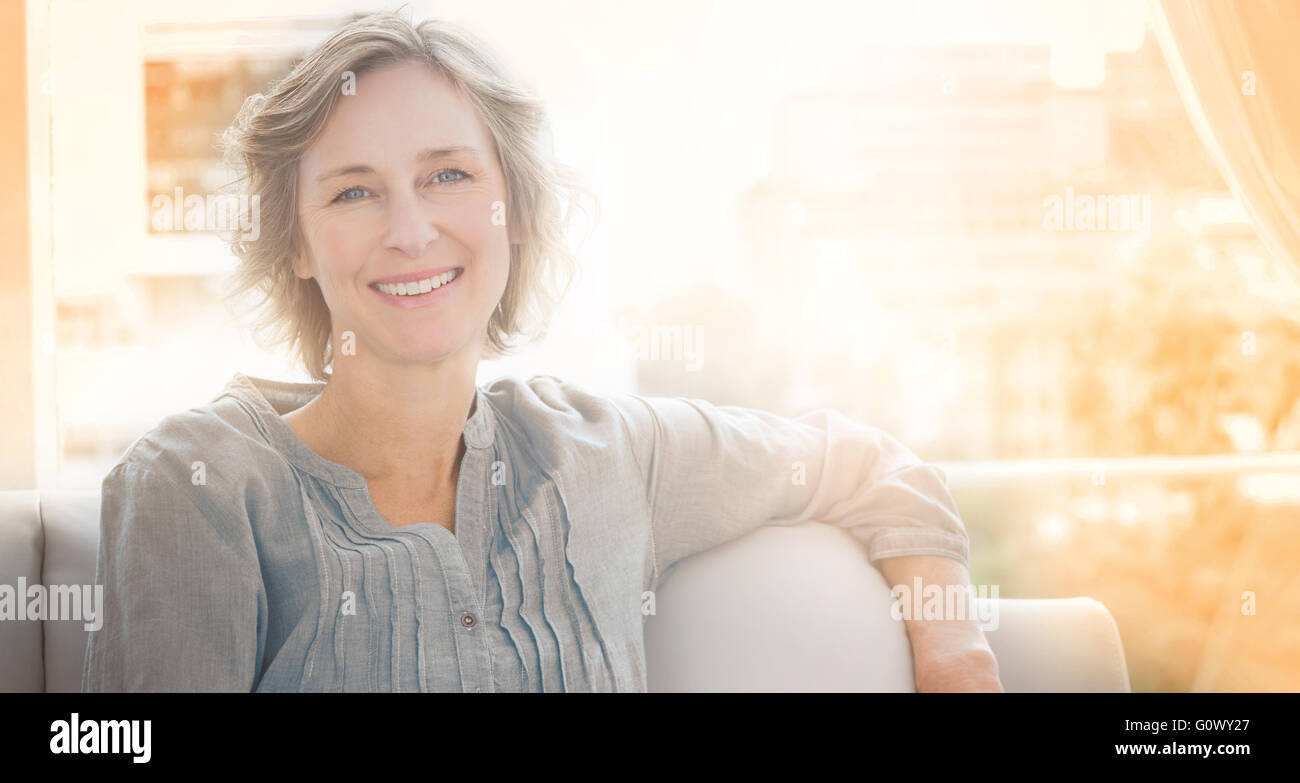 Woman on couch relaxing hi-res stock photography and images - Alamy
