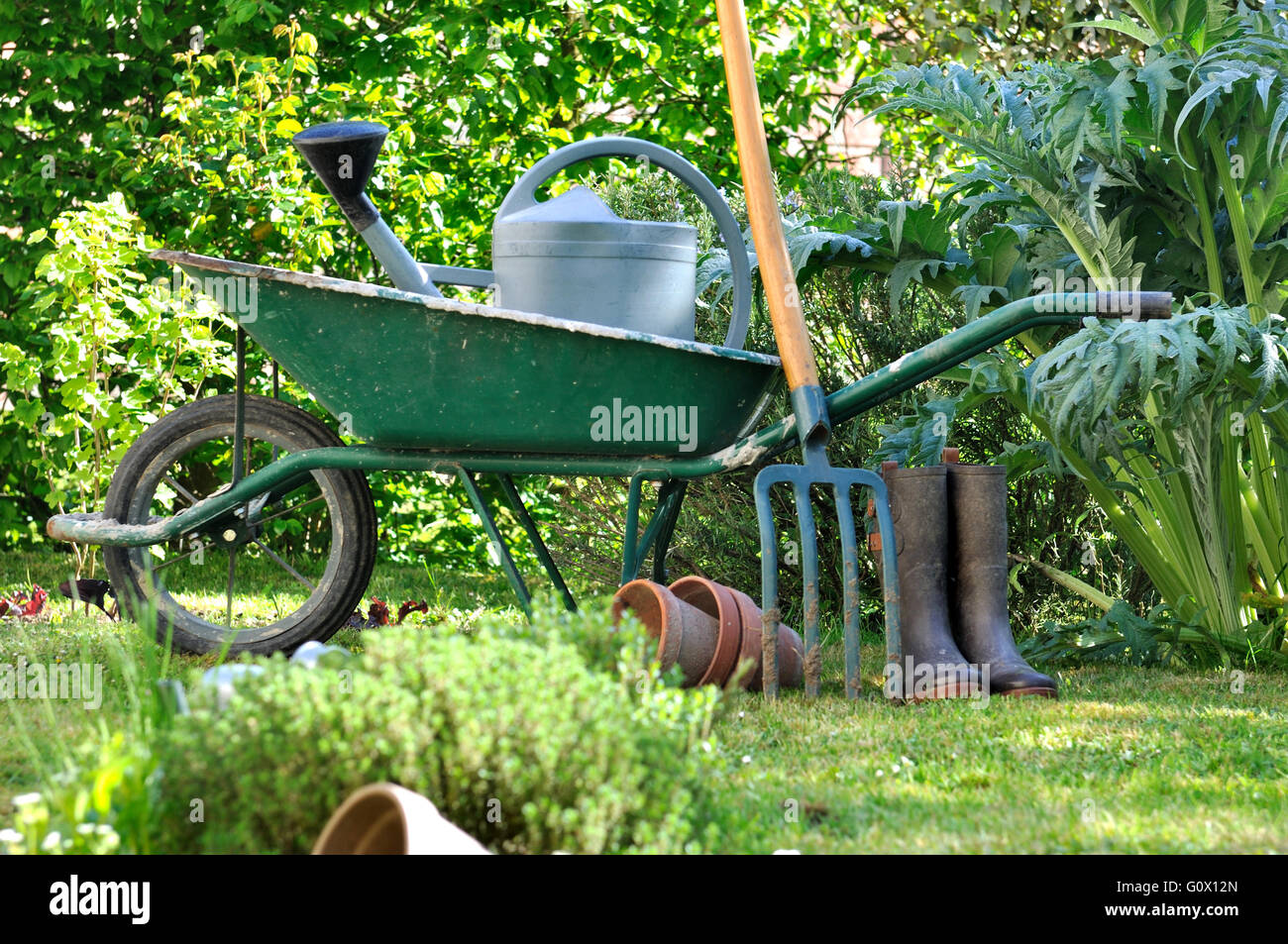 Wheelbarrow vegetable garden gardening hires stock photography and