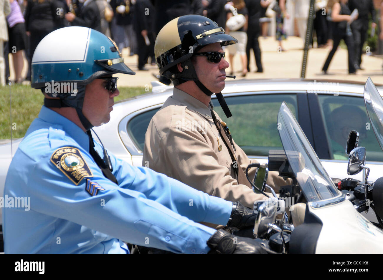 two motorcycle policemen participate in a policeman's funeral in beltsville, maryland Stock Photo