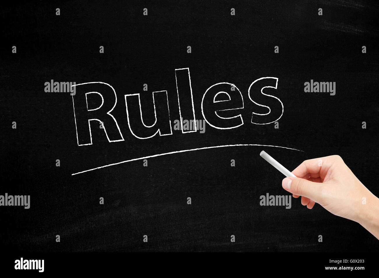 Rules written with chalk Stock Photo