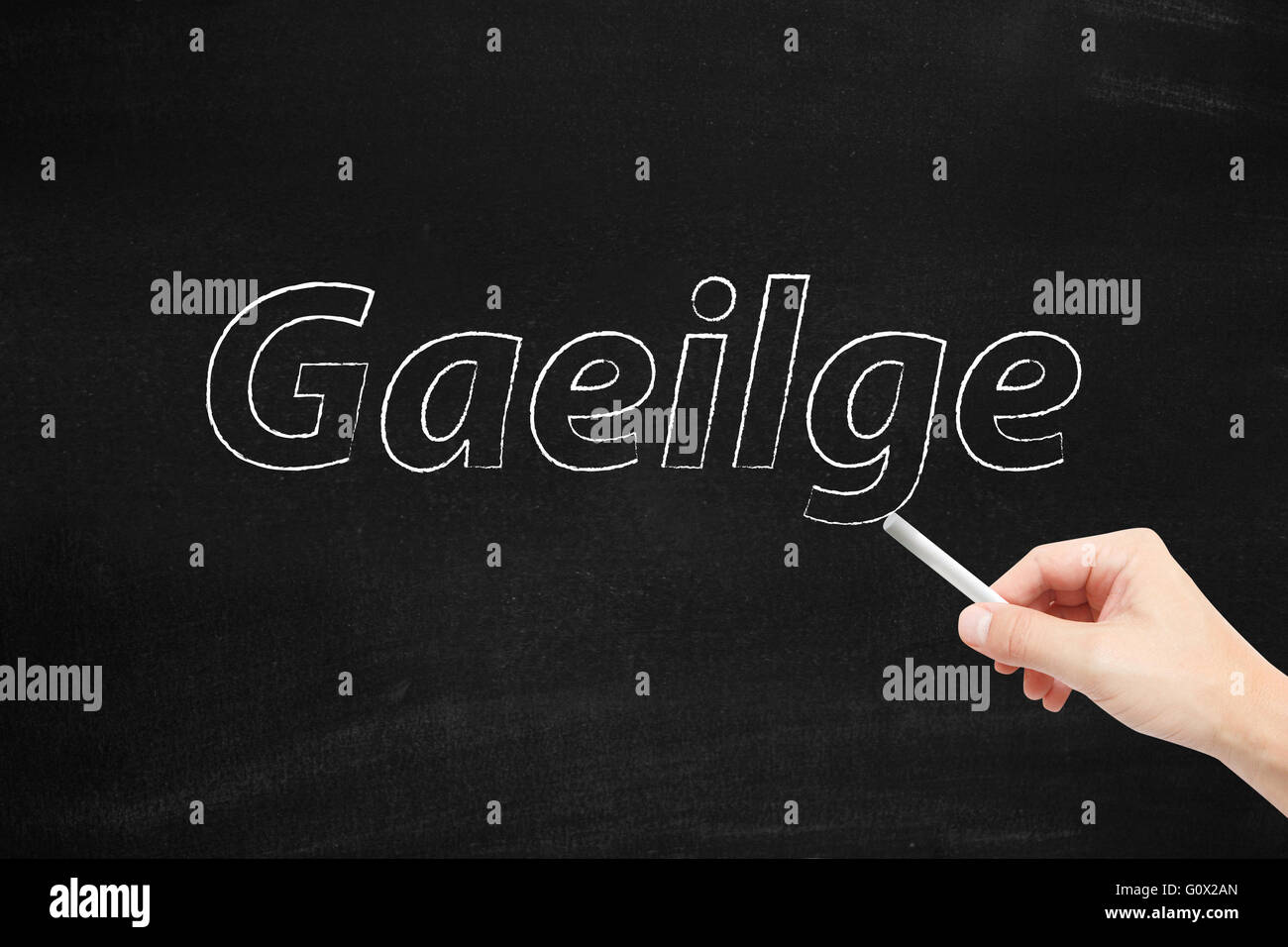 The language of Gaeilge written on a blackboard Stock Photo