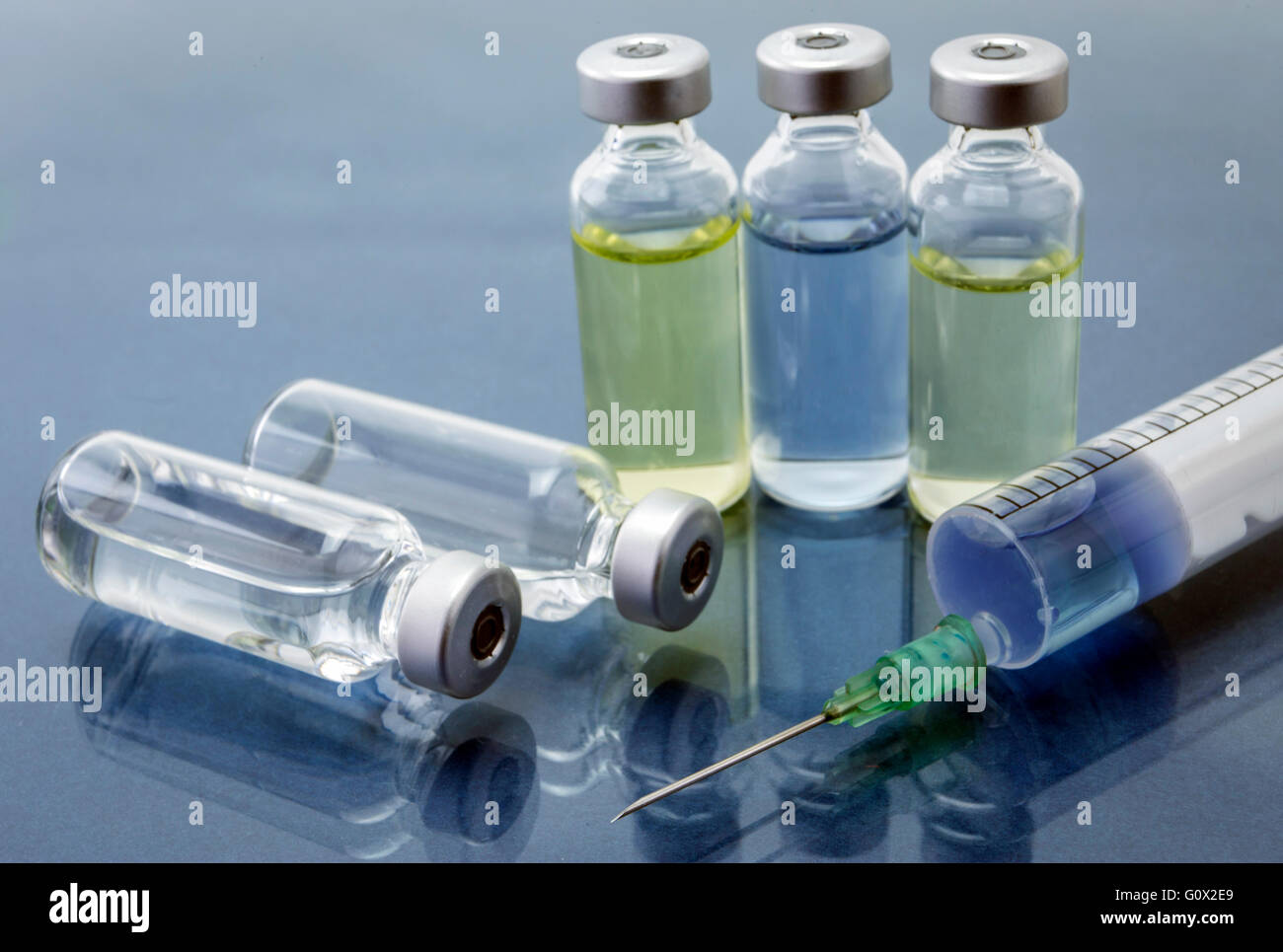 Biomedical Vials Medicine vials and syringe, conceptual image Stock Photo - Alamy