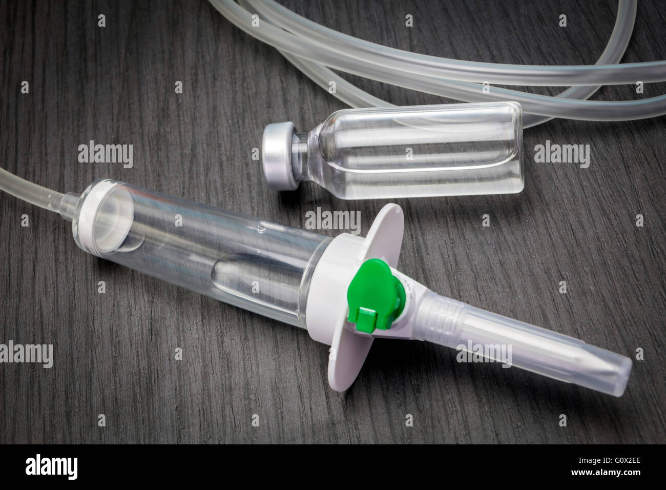 Medicine in vial, ready for vaccine injection, administration of serum system Stock Photo