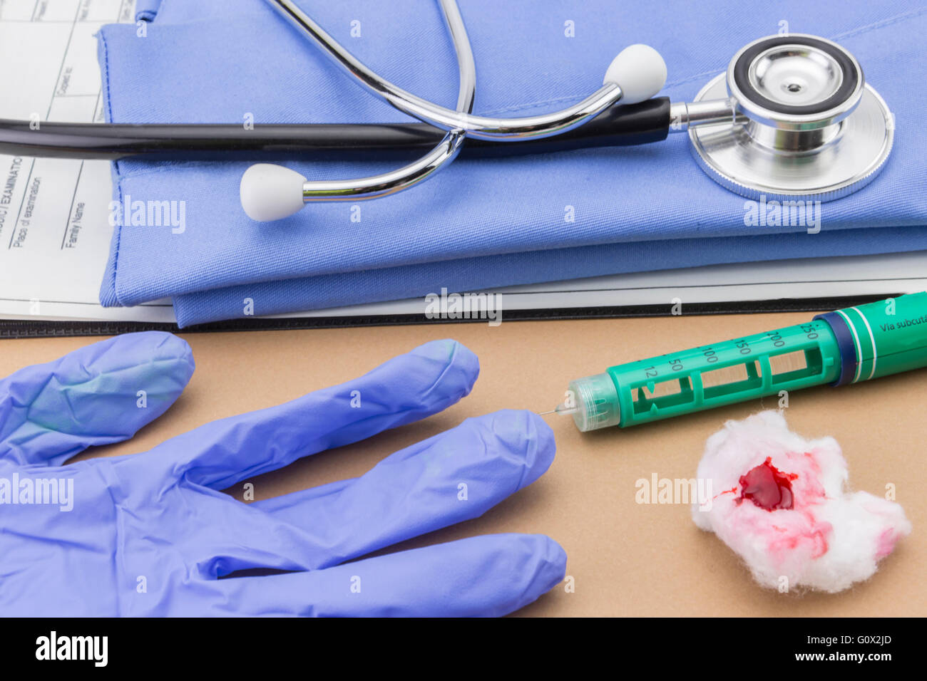 Insulin injecting pen and stethoscope, concept of diabetes Stock Photo