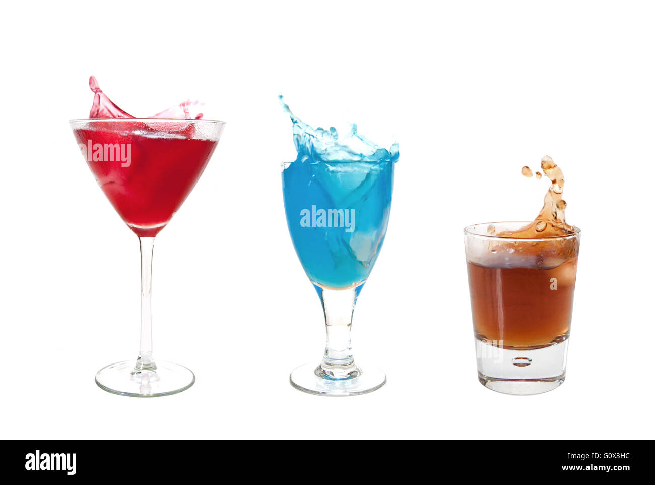 Three different cocktails with a splash over a white background Stock Photo