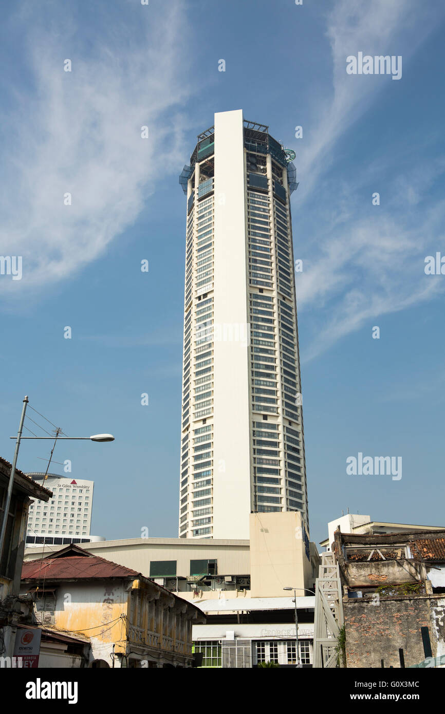 Georgetown's tallest building the Komtar being renovated with the addition of an external lift to a sky walk under construction Stock Photo