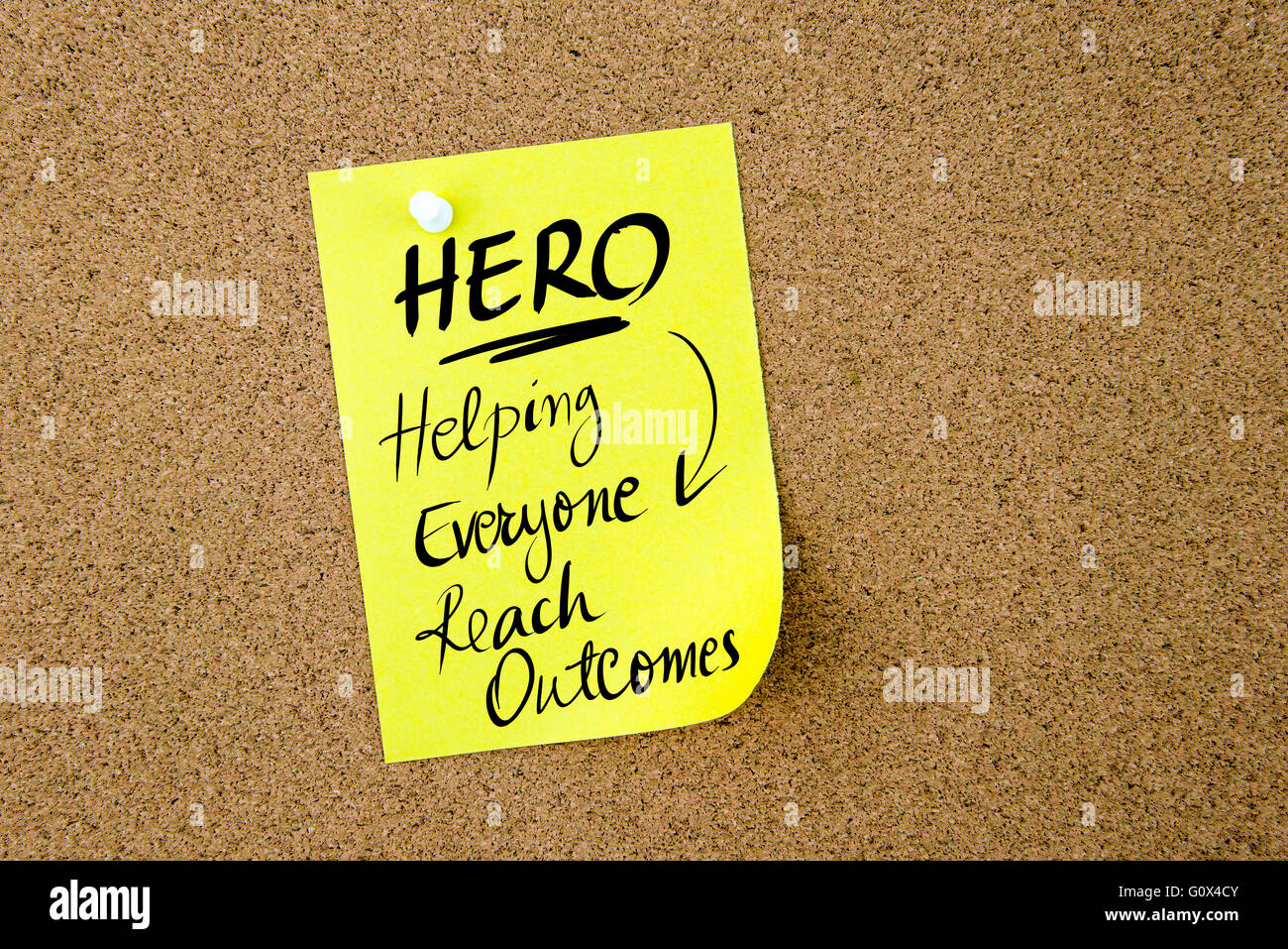 Business Acronym HERO Helping Everyone Reach Outcomes written on yellow  paper note pinned on cork board with white thumbtack, copy space available  Stock Photo - Alamy