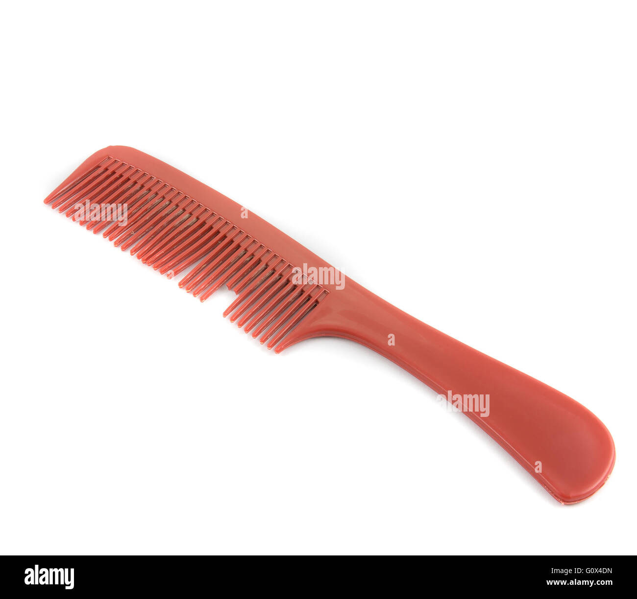 old and broken red comb on white background Stock Photo Alamy