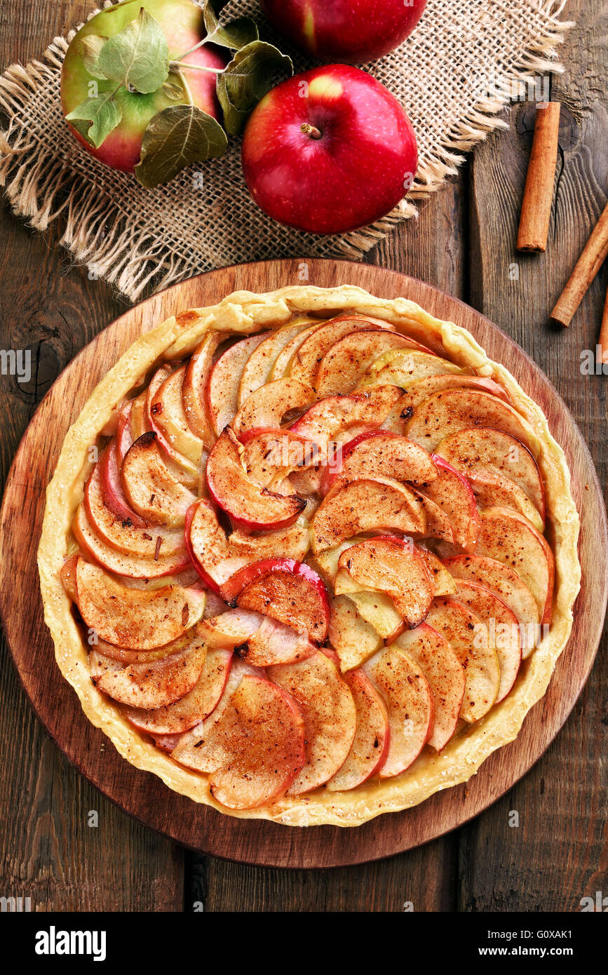 Apple pie on wooden table, top view Stock Photo