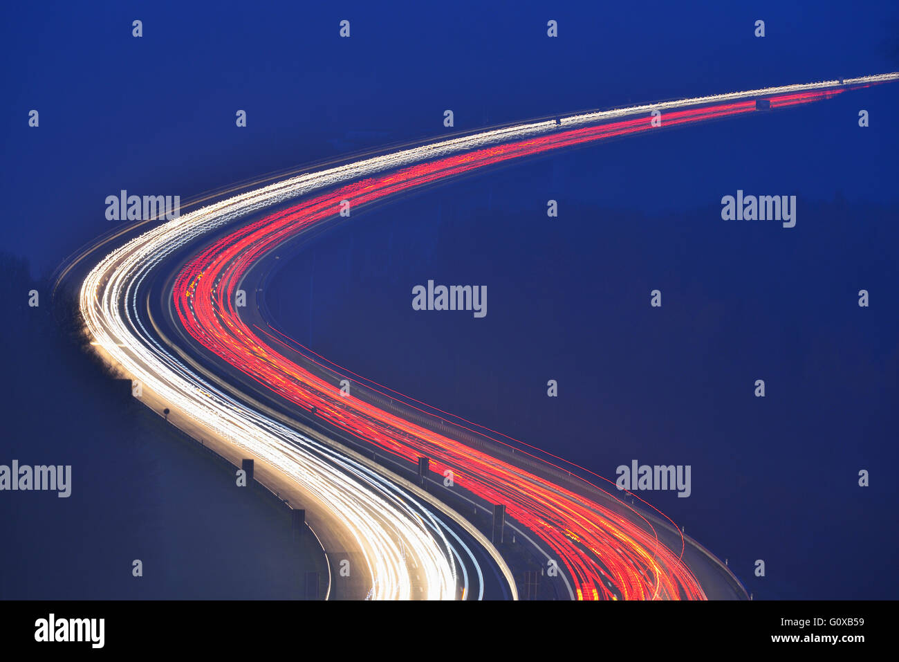 Light Trails on Highway A3 at Night, Haseltal, Rohrbrunn, Spessart, Bavaria, Germany Stock Photo