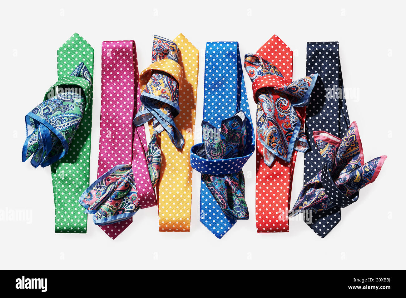 Six, coloured ties with handkerchiefs on white background in studio ...
