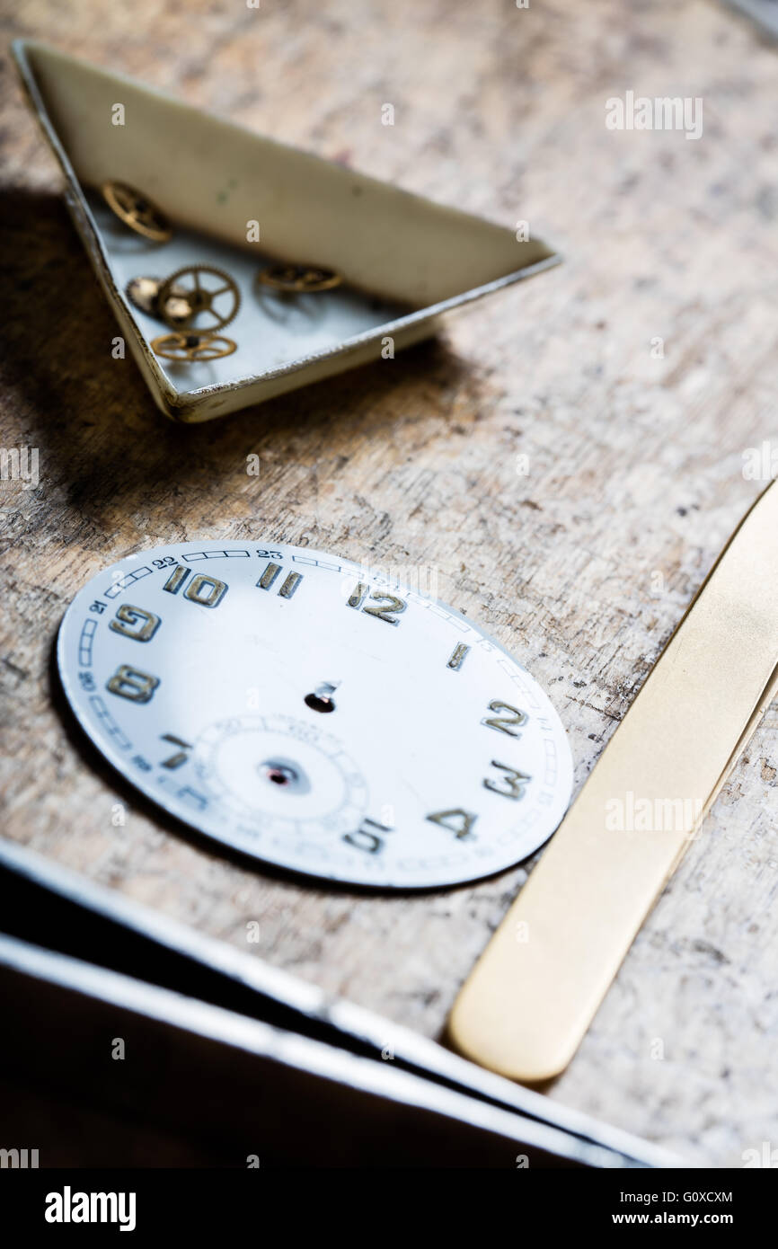 tools quadrant and clockworks on a wooden table in a watchmaker shop Stock Photo