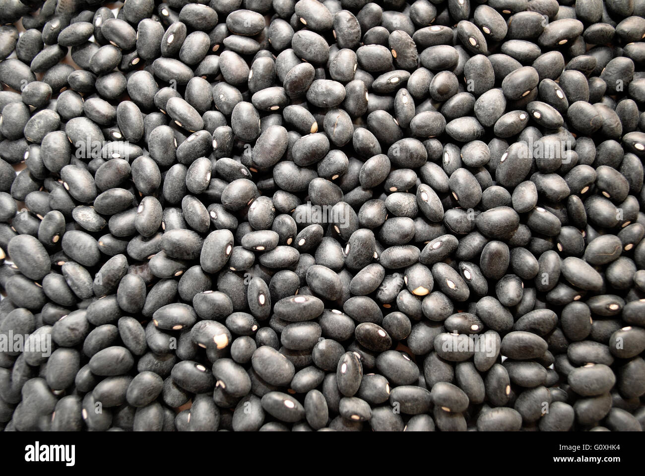 Background of Black Dried Beans Stock Photo