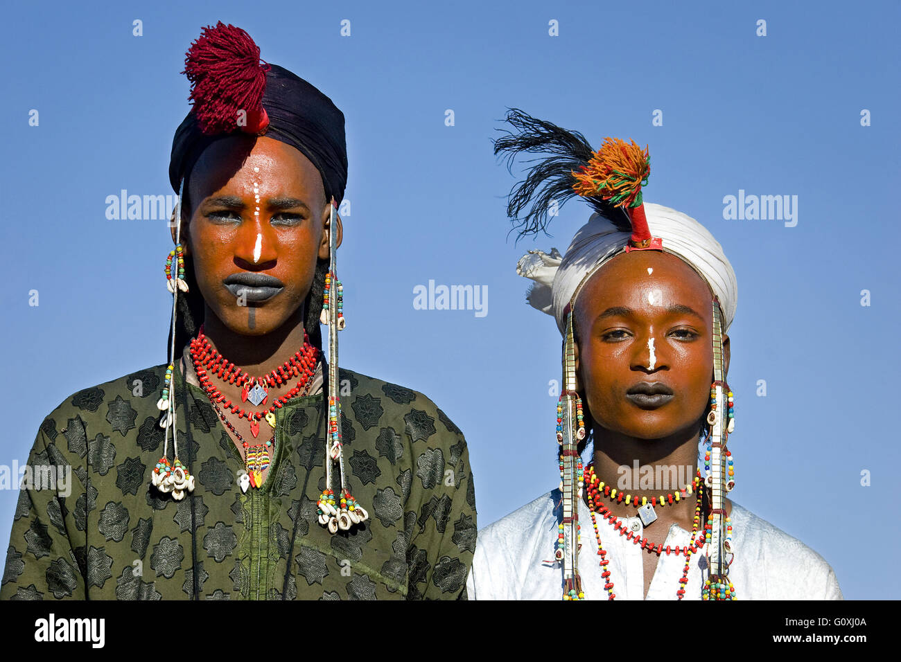 A Wodaabe-Bororo man with his face painted for the annual Gerewol ...