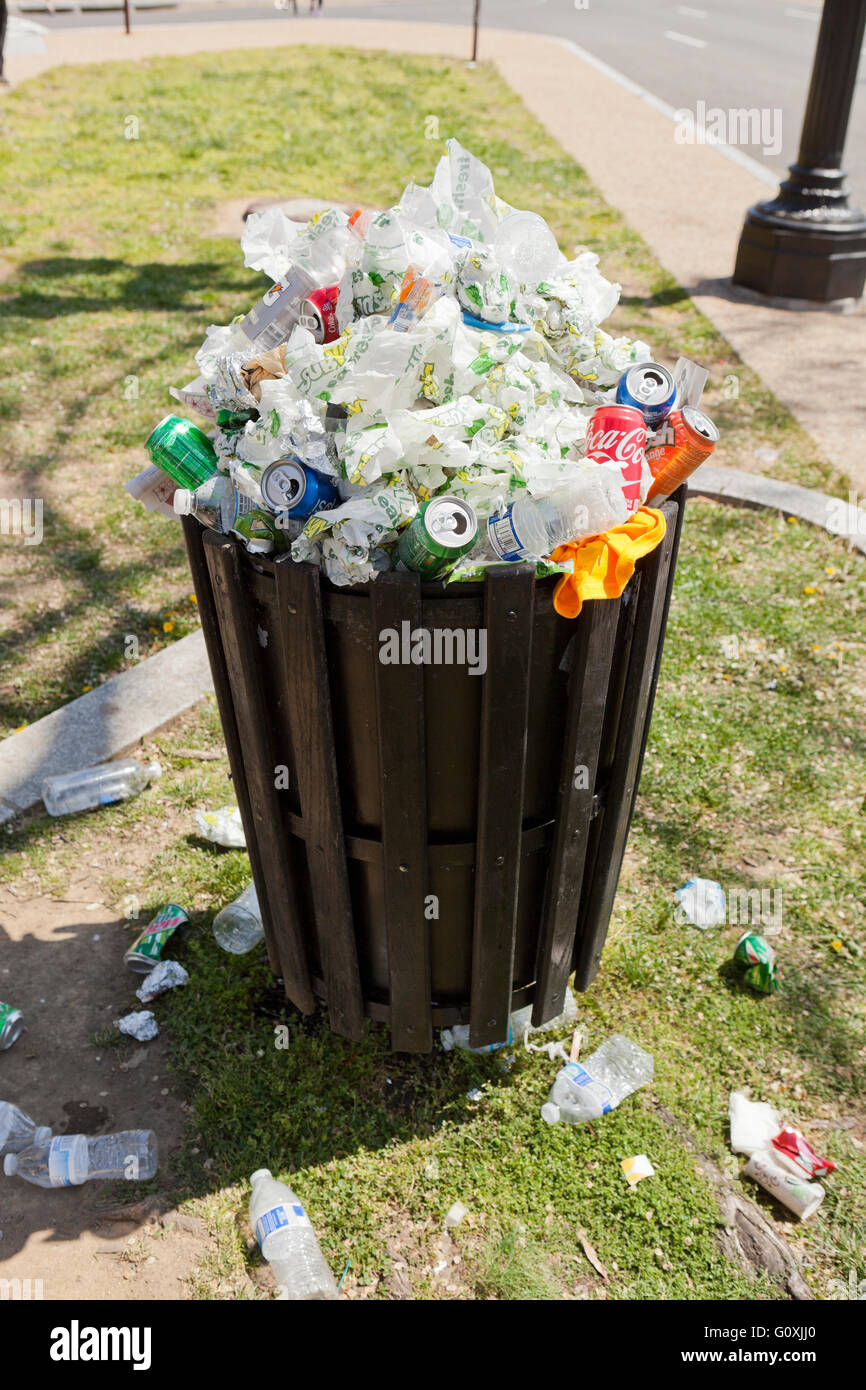 Public trash bin full after street fair - USA Stock Photo