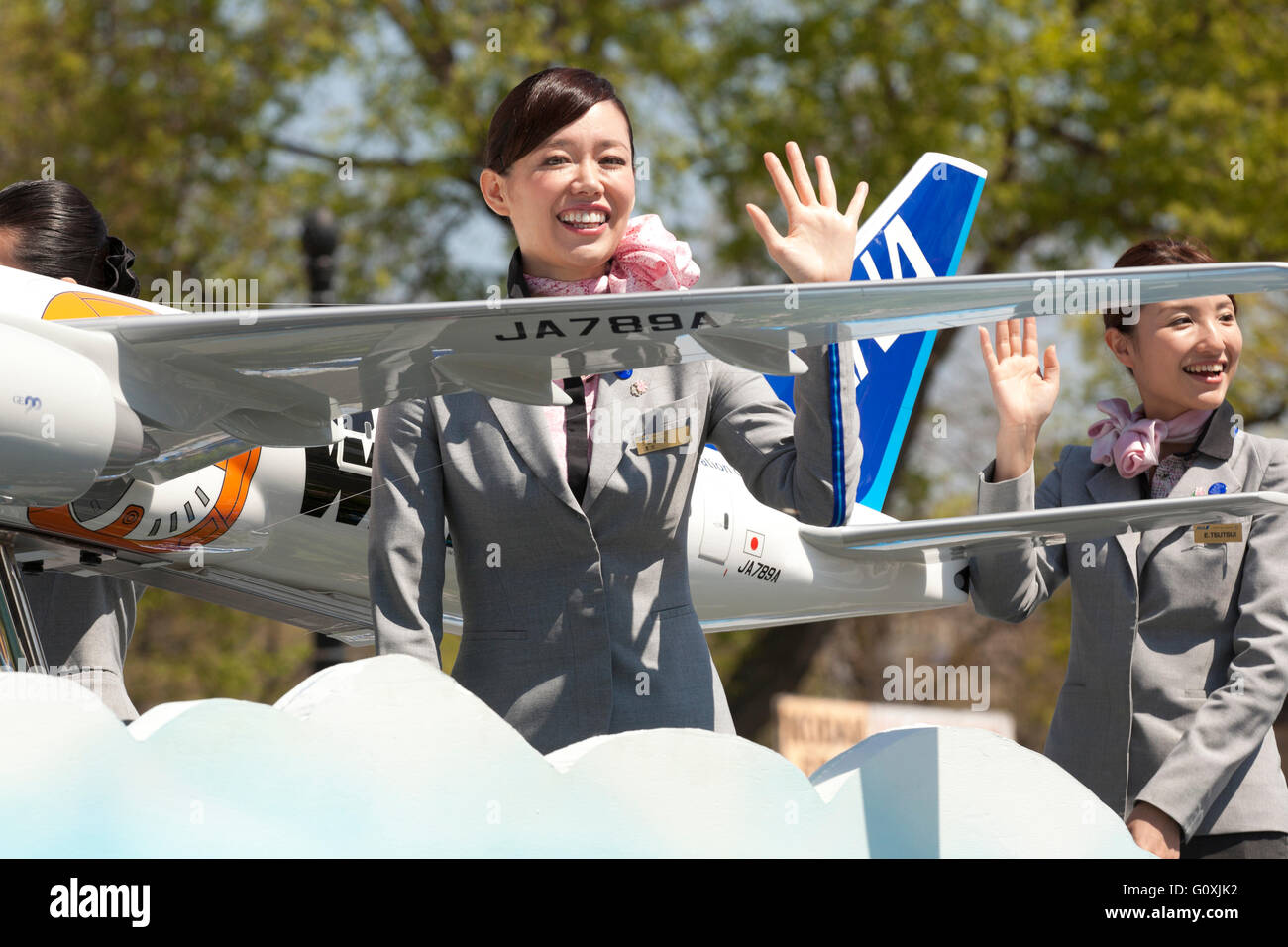 ANA Airlines flight attendant on a parade float - USA Stock Photo