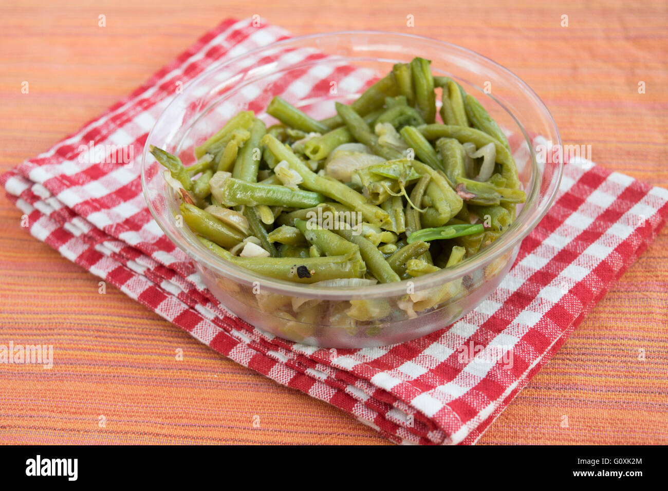 steamed green beans in a glass bowl Stock Photo