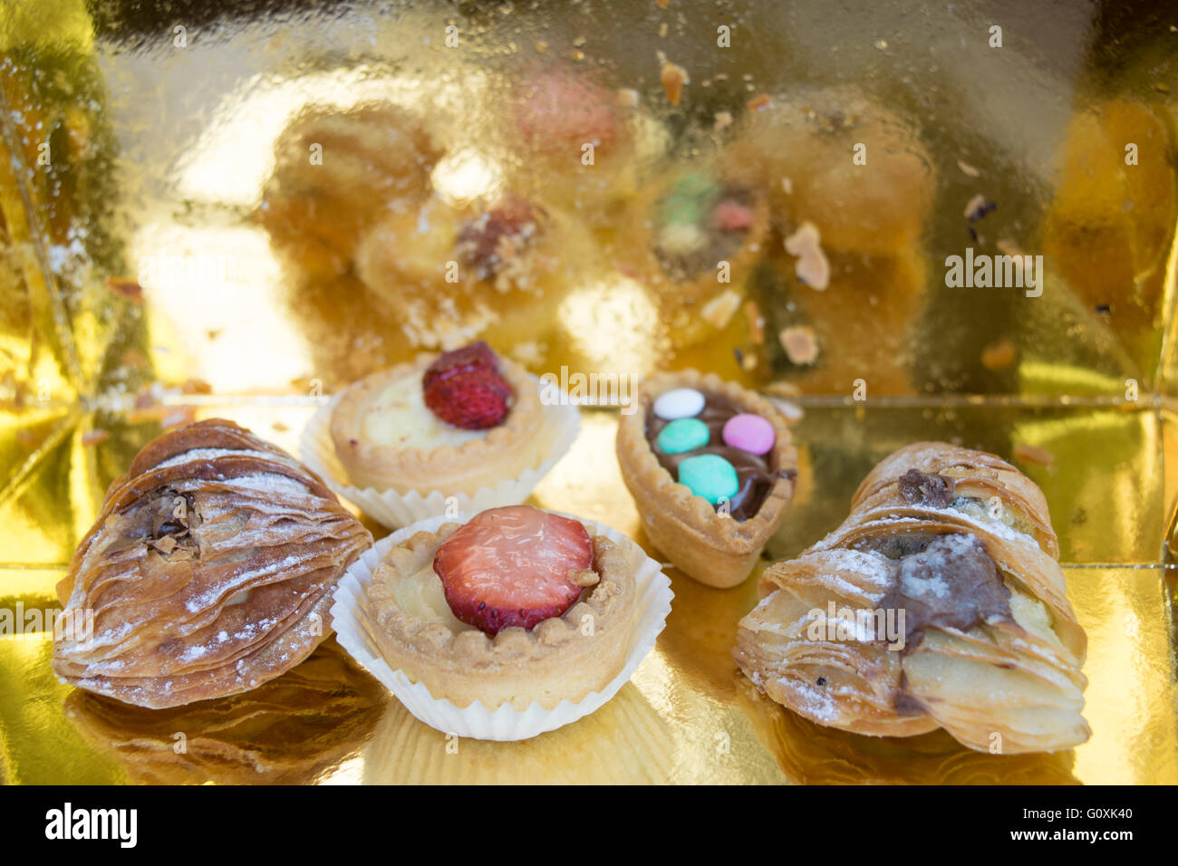 assortment of pastries stuffed with cream or chocolate or also with fresh fruit Stock Photo