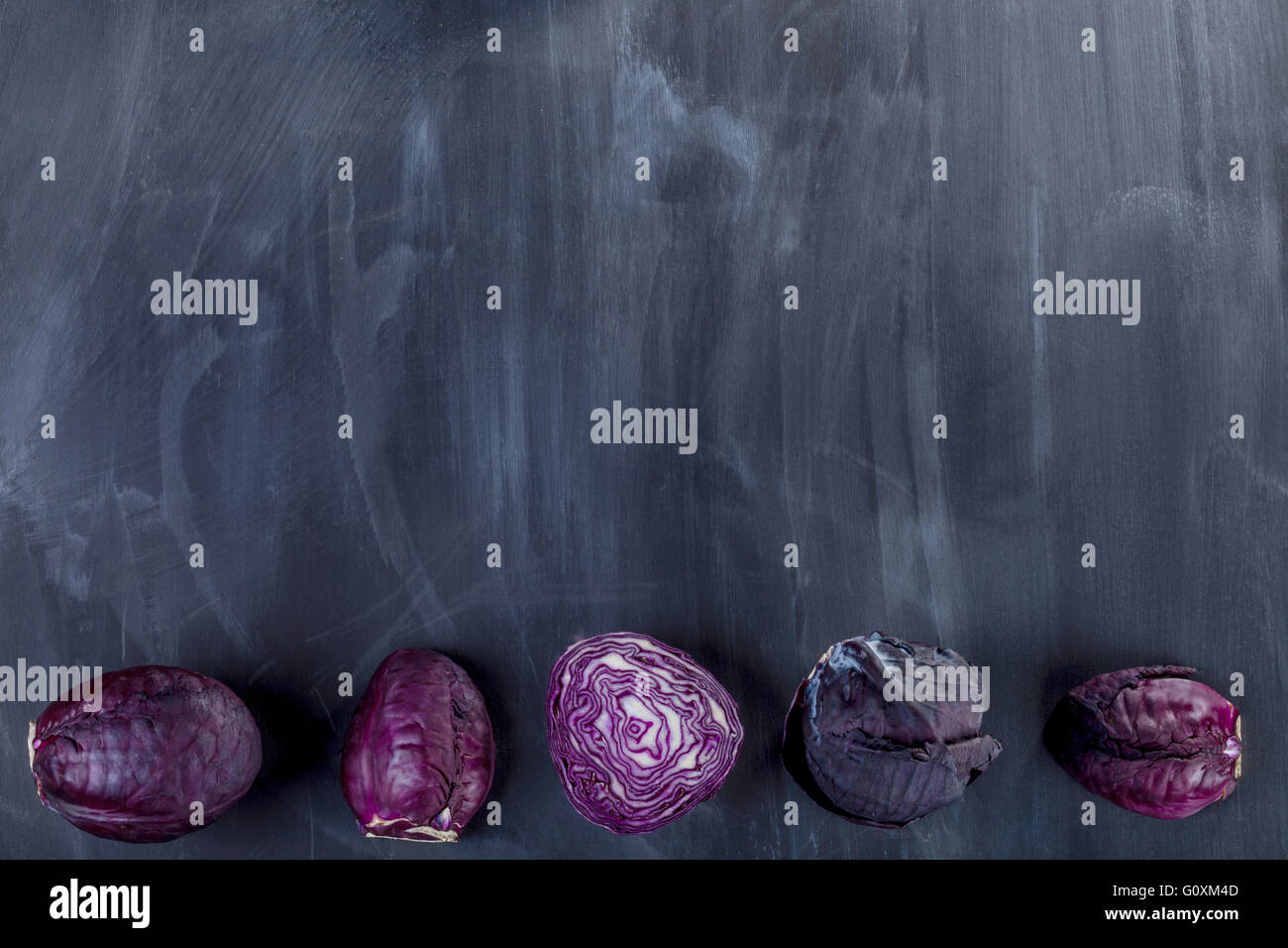 Red cabbages on the blackboard from the top Stock Photo
