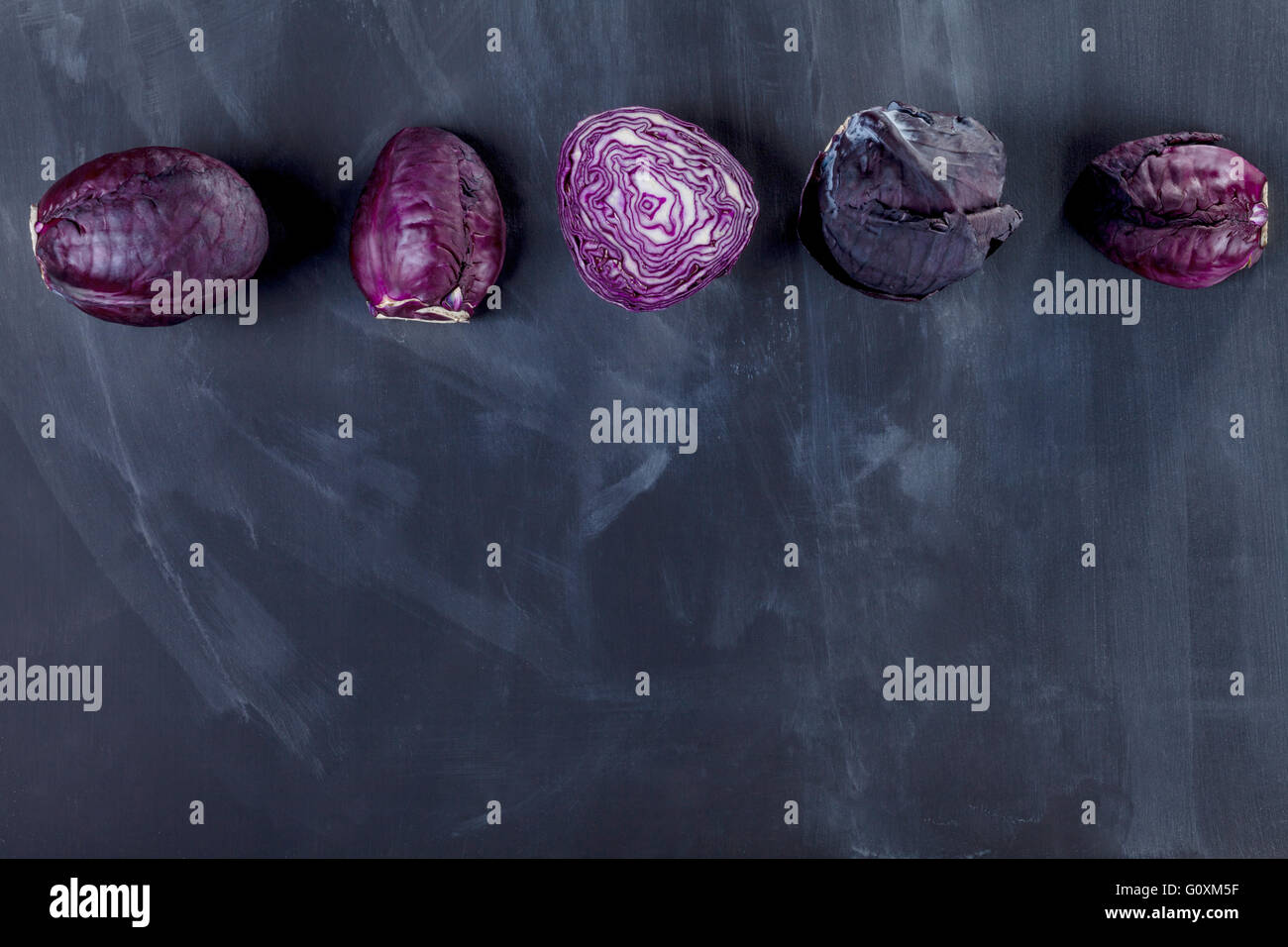 Red cabbages on the top of blackboard Stock Photo