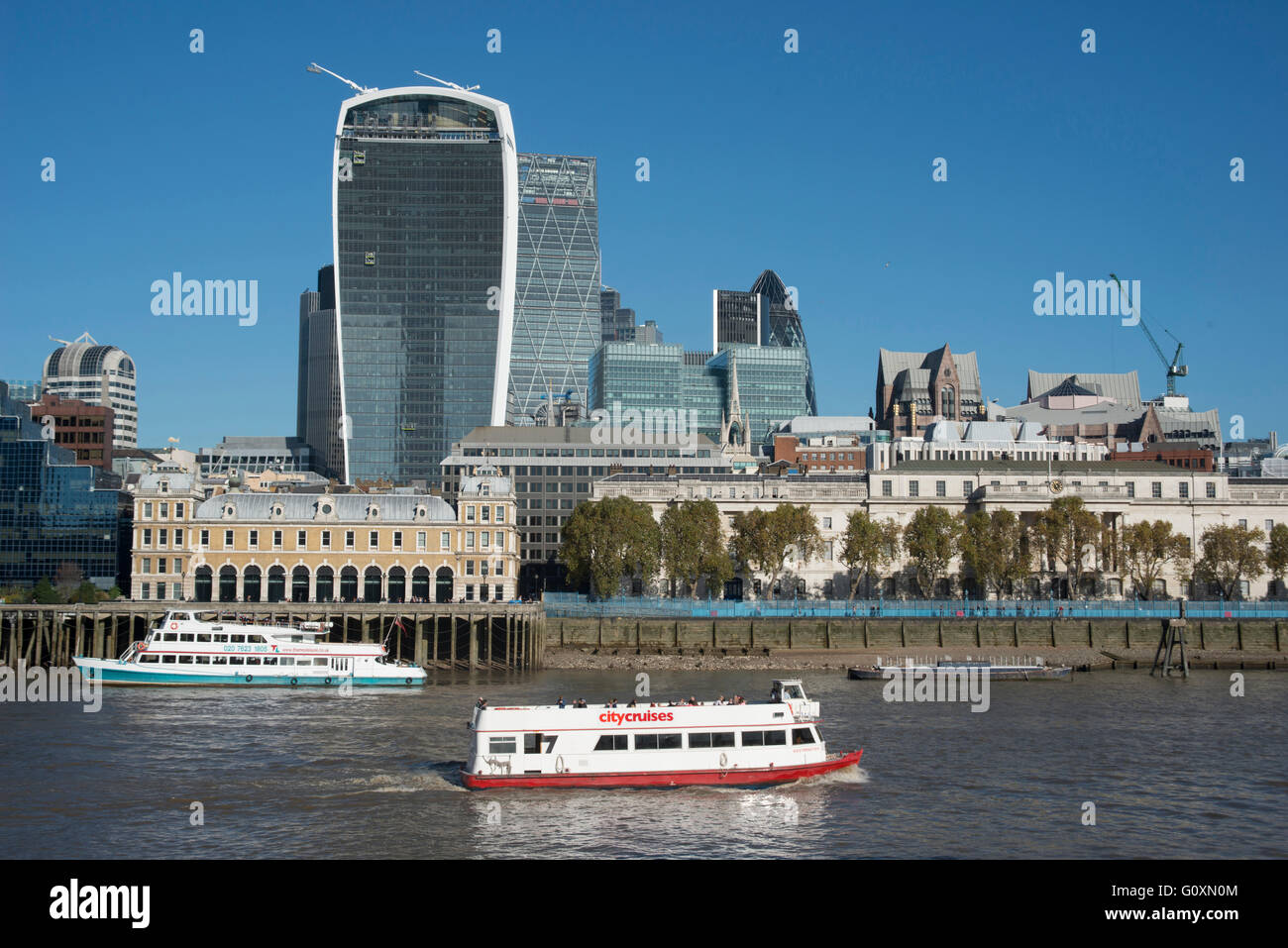 View of new and old buildings from the Thames, including 20 Fenchurch Street, designed by Vinoly and Rogers, known as the walkie-talkie, and the Leadenhall Building, also known as the Cheese Grater, 122 Leadenhall Street, designed by Rogers Stirk Harbour Stock Photo