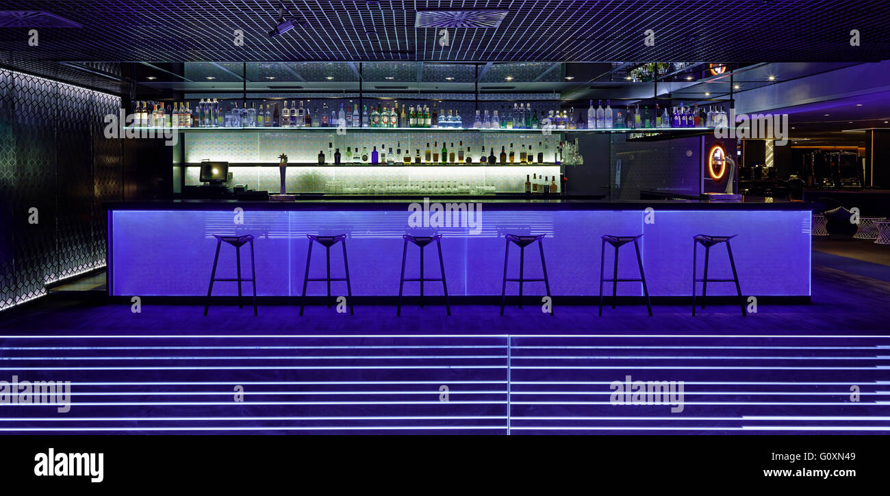 Casino Barcelona, the interior of the bar area with blue and green low lighting. Stock Photo